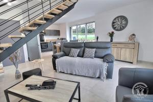 Maisons de vacances La grange du petit kernon : photos des chambres