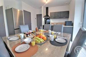 Maisons de vacances La grange du petit kernon : photos des chambres