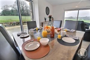 Maisons de vacances La grange du petit kernon : photos des chambres