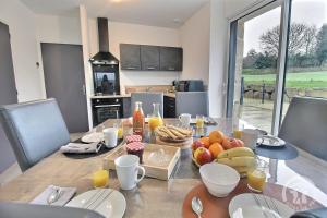 Maisons de vacances La grange du petit kernon : photos des chambres