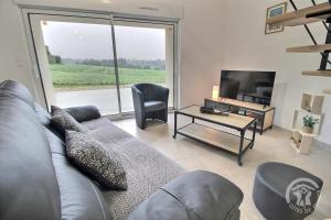 Maisons de vacances La grange du petit kernon : photos des chambres