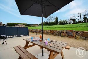 Maisons de vacances La grange du petit kernon : photos des chambres