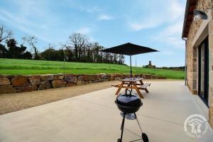 Maisons de vacances La grange du petit kernon : photos des chambres