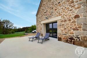 Maisons de vacances La grange du petit kernon : photos des chambres