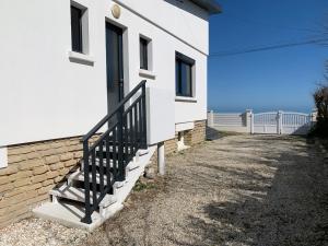 Maisons de vacances Villa de la plage, front de mer, Juno beach : photos des chambres