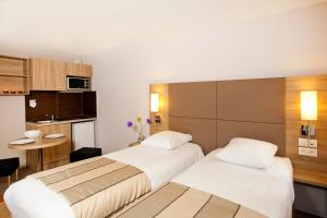 Appart'hotels Sejours & Affaires Strasbourg Kleber : photos des chambres