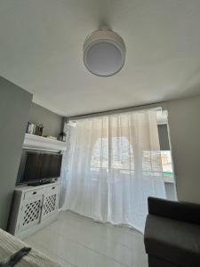 Studio with pool and sunrise view at 10 min beach walk