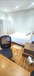 Habitaciones privadas en piso frente a playa Ondarreta, baño compartido