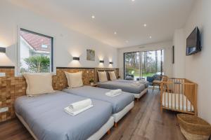 Villas La Villa Leo face au Centre Equestre et Piscine : photos des chambres