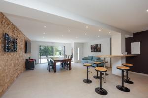 Villas La Villa Leo face au Centre Equestre et Piscine : photos des chambres