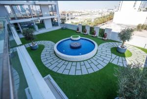 Aesthetic 1BR with Stunning Pool in JVC