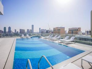 Aesthetic 1BR with Stunning Pool in JVC