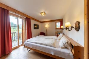 Double Room with Balcony room in Pensiun Chesa Pool