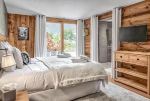 Villas JAMES TAMG24 - Stunning ski in ski out luxury chalet with indoor pool & cinema : photos des chambres