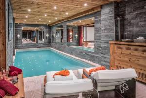 JAMES TAMG24 - Stunning ski in ski out luxury chalet with indoor pool & cinema