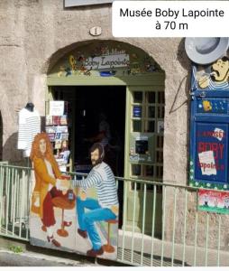 Maisons de vacances Pierres anciennes et soirees douces Coeur de ville : photos des chambres