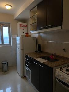 Departamento barrio cerrado en altura