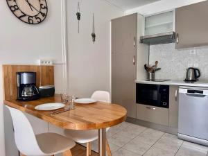 Appartements A 2 pas du port de plaisance : photos des chambres
