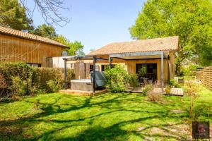 Gastes, Charmant chalet en bois avec Jacuzzi 6 pers