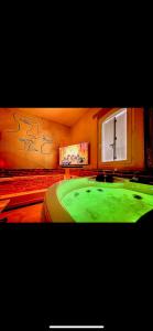 Appartements L'Antre vue - jacuzzi au chateau : photos des chambres