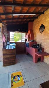 Casa Espaço Sara Piscina Aquecimento Solar total privacidade, área gourmet completa com churrasqueira fogão a lenha, a 5min do centro e do parque das águas