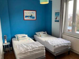 Maisons de vacances Maison avec grand jardin et terrasse dans quartier de la Benedictine : photos des chambres