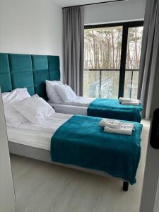 Apartament Słoneczny AKTENA Shellter Rogowo