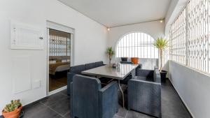 Cozy 2BR near Oura Beach by LovelyStay