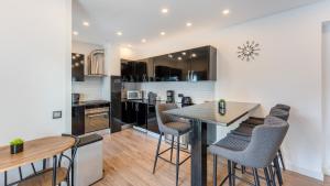 Cozy 2BR near Oura Beach by LovelyStay