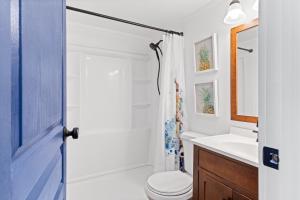 Remodeled studio with new furnishings, induction cooktop, and steps to the beach