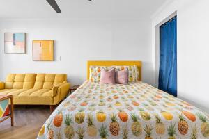 Remodeled studio with new furnishings, induction cooktop, and steps to the beach