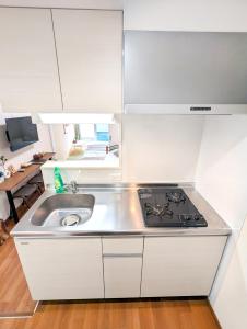 Sun生A号棟201室直达关西机场 电梯公寓 采光良好 仅2站到难波 直达梅田心斋桥天王寺 附带私人厨房