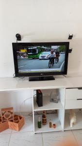 hospede na região Pampulha com garagem e churrasqueira