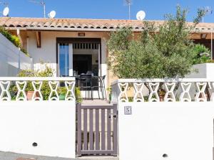 Villas Villa T2 avec mezzanine, Wi-Fi, climatisation, animaux admis, parking, pour 4 personnes - FR-1-409A-34 : Villa