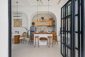 Chic All-White Villa with Pool and Fire Pit