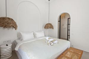 Chic All-White Villa with Pool and Fire Pit