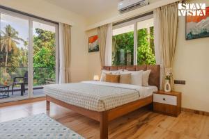 StayVista at 27 Flora with Lawn, Pool, WiFi