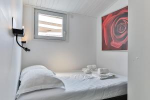 Maisons de vacances La Cabane Rouge - Wifi - Parking : photos des chambres