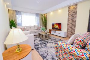 celestial two bedroom apartment with swimming pool fully equipped gym ample parking space children playing ground and a relaxing rooftop with amazing scenic views