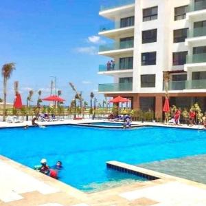 شاليه فندقي أرضي بحديقه خاصه في منتجع بورتوسعيد