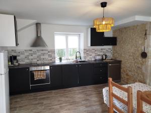 Maisons de vacances House near Bayeux : photos des chambres