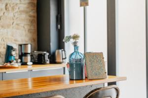 Appartements La Fabrique a Souvenirs : photos des chambres