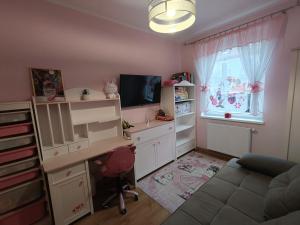 Apartament Rodzinny z ogródkiem w centrum Giżycka