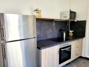 Appartements Maguilon B - Proche Riviere et Vals les bains : photos des chambres