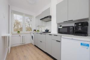 Bright Apartments Close to City Centre by Noclegi Renters