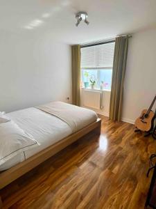 Cosy 1 bedroom flat near Heathrow with parking