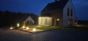 Domy pod lasem BANIA-SAUNA - Połęczyno