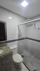 4 suites Frente Mar Churrasqueira ar condicionado 2 vagas