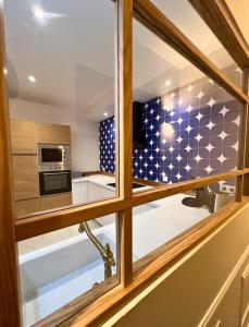 Appartements Le secret du Damier by Miss K : photos des chambres