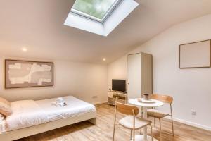 Appartements La Suite Sable - Cosy studio - Proche Metro B : photos des chambres